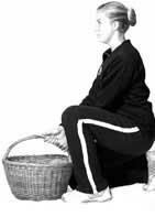 Correct squatting technique lifting object from ground