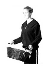 Correct posture carrying basket close to body