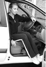 Using lumbar support cushion while driving vehicle
