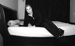 Pushing up from side lying position to sit up in bed