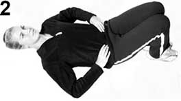 Supine lumbar rotation knee roll mobility exercise