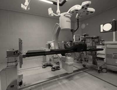 Modern neurosurgery operating theatre with imaging equipment