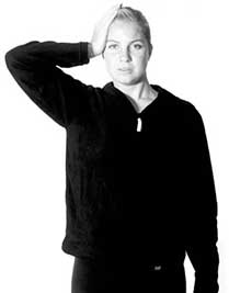 Woman performing isometric neck side bend strengthening exercise