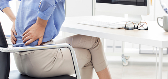 Office worker with lower back pain